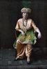 Woman wearing traditional Turkish clothing (yellow and green)