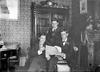 Men (3) with sheet music