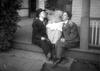 Two young men and 1 woman