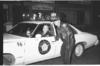 Officers and squad car