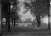 White House ground looking over Franklin Conservatory at distant view of Washington Monument